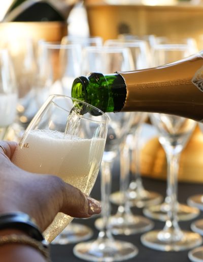 Champagne being served at a beach bar